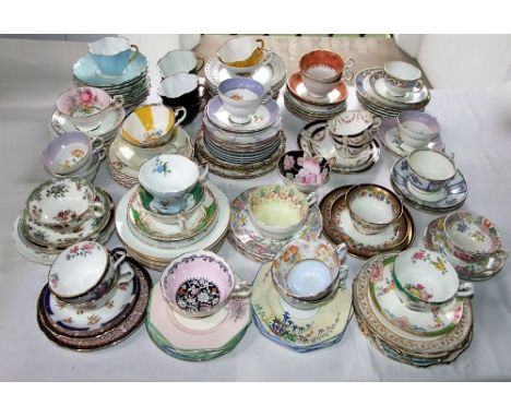 A extensive collection of mainly 20th century decorative teawares, trios, etc, including eight Bristol porcelain plates desig