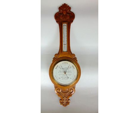 Oak banjo barometer thermometer, the dial inscribed 'Harry Hall Ltd, The Coat Breaches Habit and Costume Specialist, 181 Oxfo