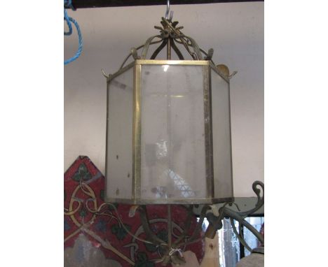 A Georgian style sheet metal framed hanging porch light of hexagonal form with glazed panels