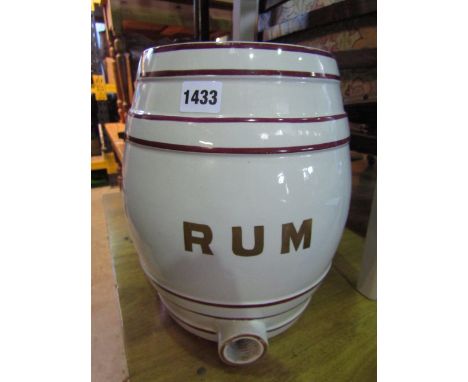 A late 19th century ceramic rum barrel with Sunderland lustre pink bands complete with lid