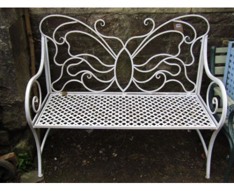 A contemporary cream painted light steel frame two seat garden bench with lattice seat and decorative pierced butterfly shape