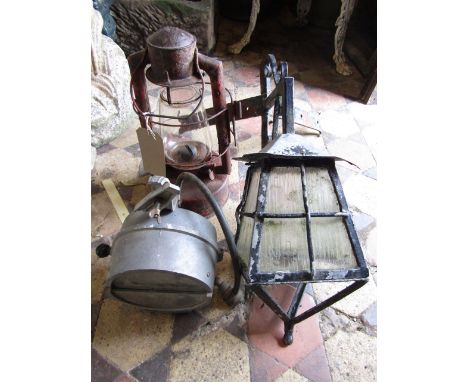 A vintage bullfinch cast alloy framed gas light, further vintage storm lantern with oval brass label S Young & Sons Enterpris