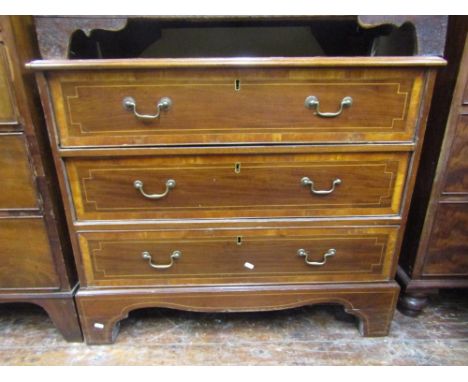 A Georgian mahogany chest of three long drawers, with satinwood and other banded detail, brass fittings and raised on bracket