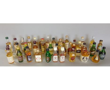 A collection of 40 bottles of whiskey miniatures mainly scotch to include Caragganmore, The Balvenie, Glen Grant, etc