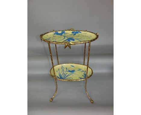 An Aesthetic movement two tier cast brass and ceramic buffet, fitted with two porcelain oval plates decorated in relief with 