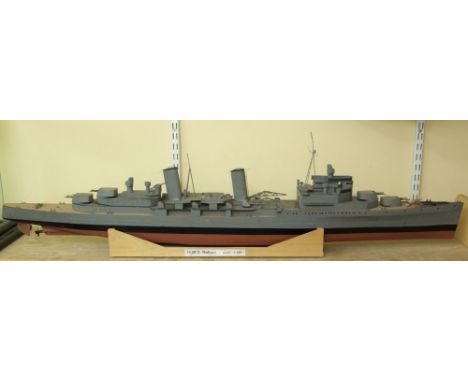 A timber model of HMS Belfast in camouflage colours, 130cm long