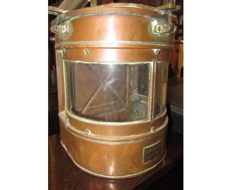 A World War II marine lantern in copper and brass together with a further collection of brass light fittings, a cased typewri