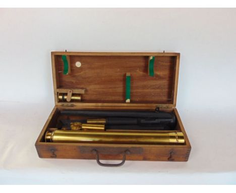 A mahogany cased brass telescope with ebonised wooden tripod stand
