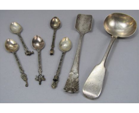 Silver Stilton scoop together with further silver sauce ladle and a set of five novelty Eastern white metal teaspoons, 5 oz a