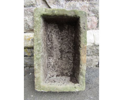 A natural rough hewn trough of rectangular form 58 cm long x 36 cm wide x 26 cm deep approx