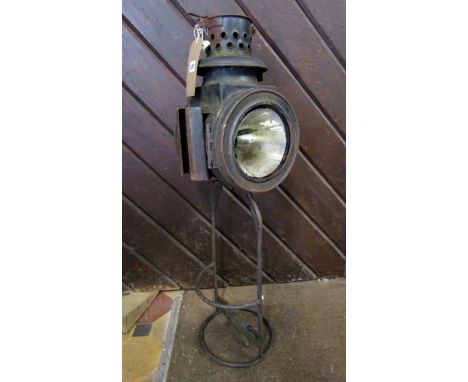 A large vintage paraffin lamp, floor standing in military green