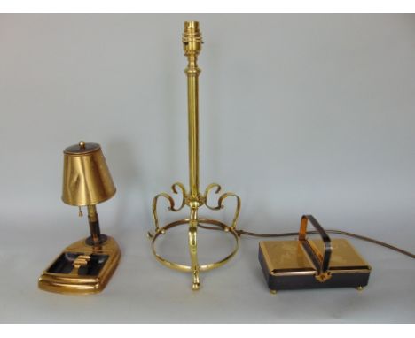 A polished brass table lamp in the manner of Benson, 43cm high; together with a further brass cigarette dispenser in the form