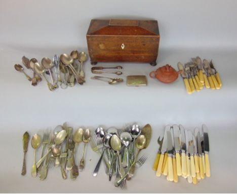 A mixed lot to include a sarcophagus tea caddy with fitted interior, a mixed collection of silver plated flatware, silver sug