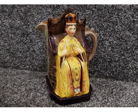 A rare Burleigh ware pottery Queen Elizabeth II coronation commemorative jug, 1953 handpainted and the Queen in yellow robes,