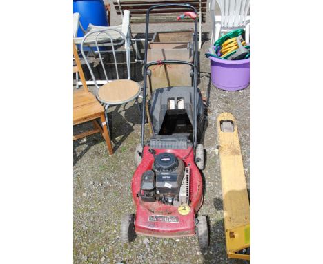 A Mountfield lawn mower with grass box, (engine turns at time of lotting).
