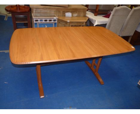 An Ercol extending table, 63" x 36" x 29" high.