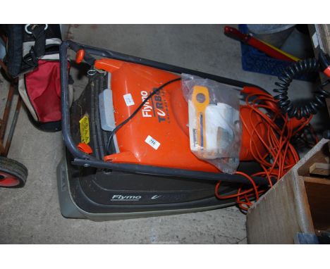 A Flymo Turbo Compact 350 mower.