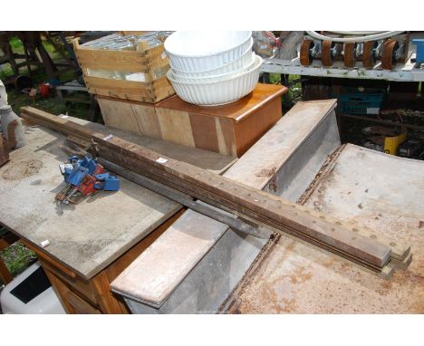 Sash clamps, pry bar and roll of polythene.