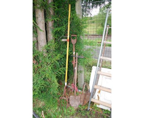 A quantity of garden tools.