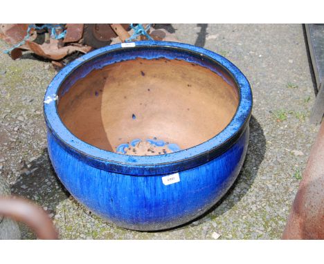 A large blue glazed planter, 20 1/2'' diameter x 12'' high.
