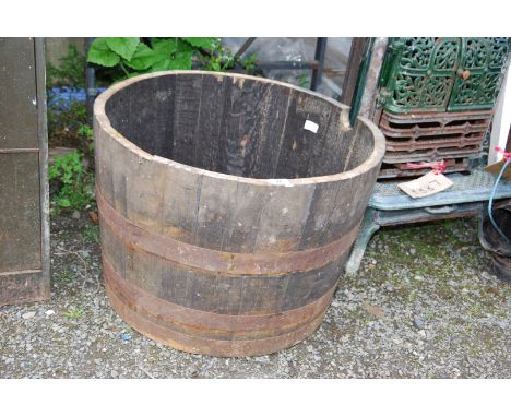 A half whisky barrel planter, 25'' diameter x 18'' high