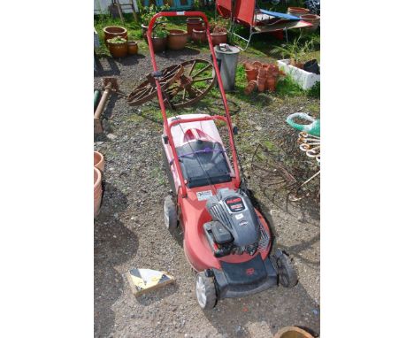 An Al-Ko lawn mower, engine turns.