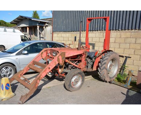 A Massey Ferguson 135 diesel-engined Farm Tractor with fore-end loader and bucket and having the local registration number OV