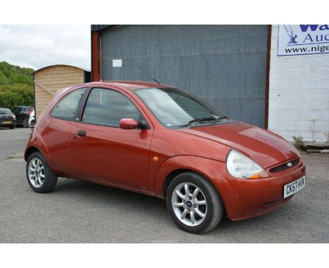 A Ford KA Zetec Climate 1299cc petrol-engined three door hatchback motor Car finished in red, registration no. CK57 HVM, firs