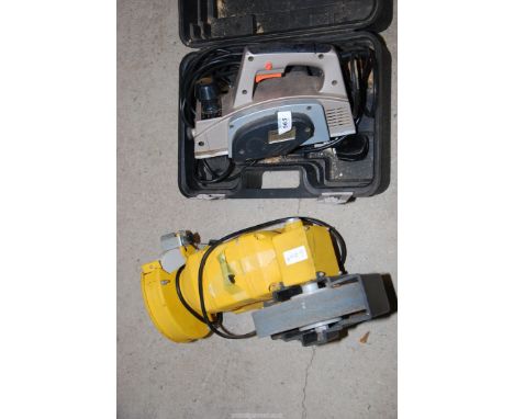 An Exel electric planer and a bench grinder.