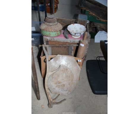 A box containing oil store, carriage lamp, old drawers, antler and rolling pin.