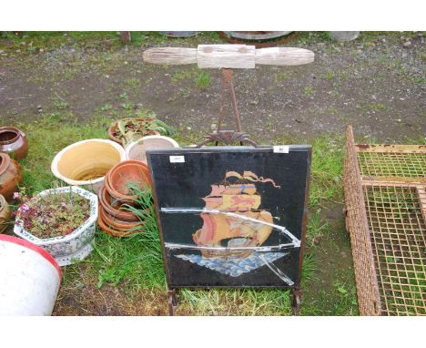 A cast iron garden roller and firescreen, a/f.