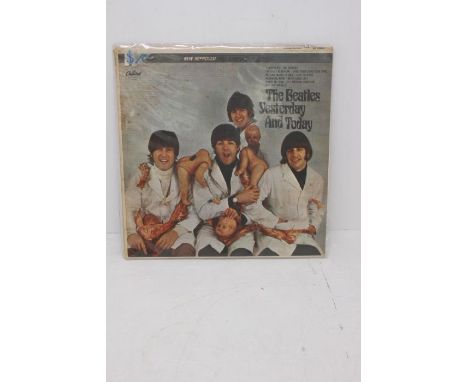 The Beatles Yesterday & Today 12 " LP Butcher Cover , 3rd State Sleeve USA Press. Matrix Number ST- X-2- 2553 B - 14         