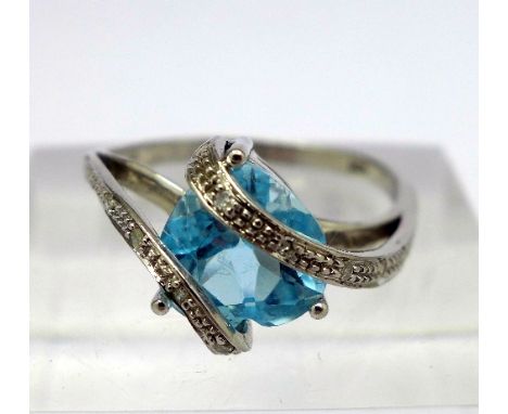 A 9ct white gold, diamond and heart shaped aquamarine ring, weight 2.8g, size O