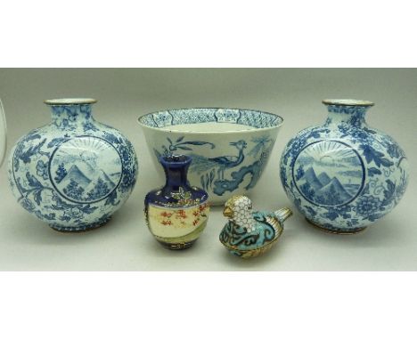 A pair of oriental blue and white vases, a Yuan pattern bowl, a small vase and a bird trinket pot