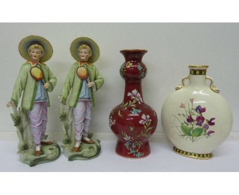 Two bisque figures, a red enamel decorated vase and a moon flask vase, a/f, height of figures 28.5cm