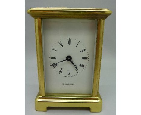 A French brass four glass sided carriage clock