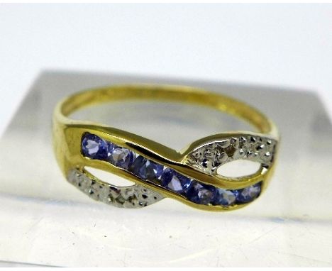 A 9ct gold, blue stone and diamond ring, weight 1.1g, size O