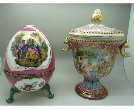 A decorative egg trinket pot and a vase with cover