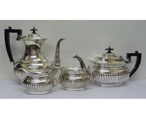 A matched gadrooned four piece plated tea service