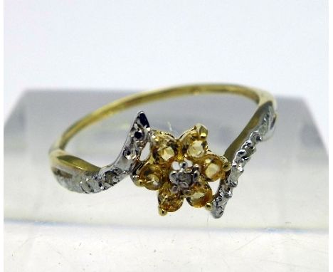 A 9ct gold, citrine and diamond ring, weight 0.9g, size O