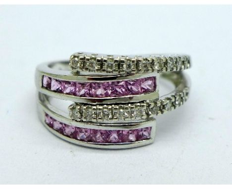 A 9ct white gold, diamond and pink sapphire ring, weight 4.8g, size O