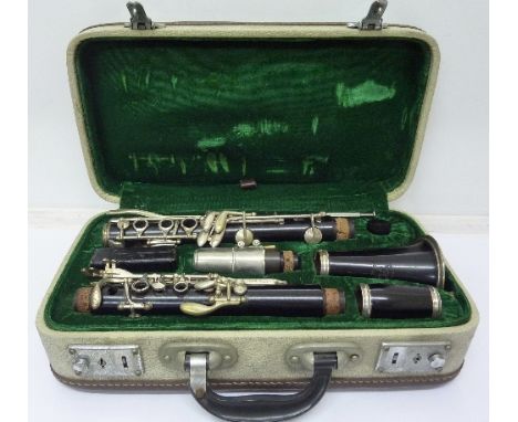 A cased clarinet, marked Skylark, made in China