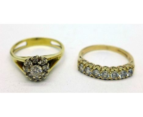 A 9ct gold and cubic zirconia ring and a yellow metal and white stone cluster ring, total weight 5.4g, sizes N and O