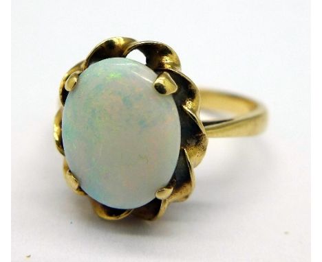 A 9ct gold and opal ring, weight 2.2g, size J