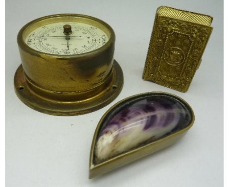 A brass snuff box in the form of a mussel shell, a barometer and a jewellery box in the form of a book