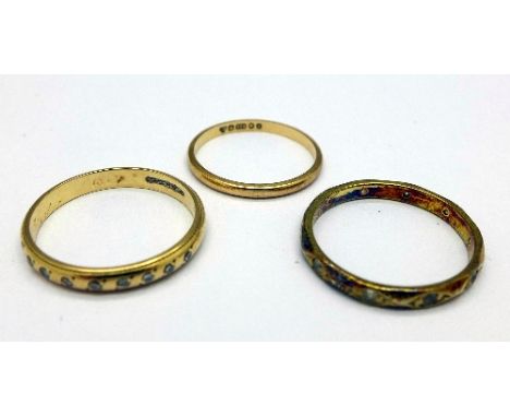 Three 9ct gold rings, weight 4.3g, two size N, one K