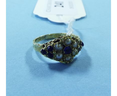 A Victorian gold, sapphire and seed pearl cluster ring Condition report Report by NG

Approx. ring size M.

Approx. 3.0 g (al