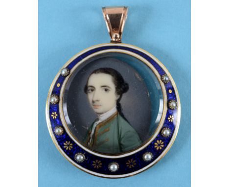 A bust portrait miniature, of a gentleman, watercolour on ivory, 3 cm diameter, in a yellow coloured metal mount, with enamel