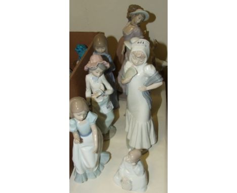 A Nao figure, 26.5 cm high, and seven others similar (8)
