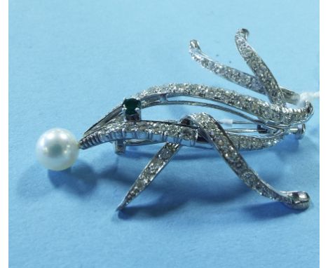 An Asprey 18ct white gold, diamond, emerald and pearl brooch, in the form of a dolphin